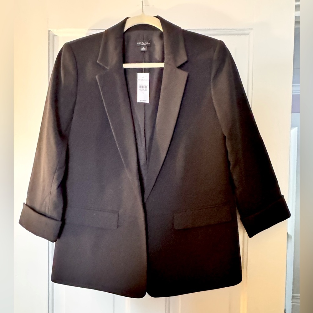 Black, longer length, notched collar, black jacket